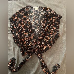 American Eagle floral wrap top.